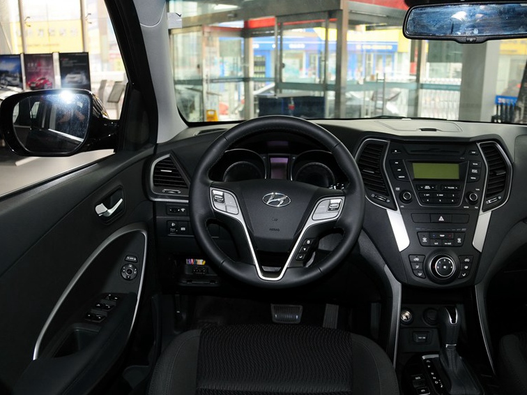 全新胜达 2013款 2.4L 自动两驱舒适型中控方向盘图片