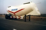 豫新9.9米18吨2轴粉粒物料运输半挂车(XX9261GFL)
