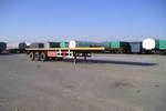 川腾12.4米30.5吨3轴集装箱运输半挂车(HBS9380TJZP)